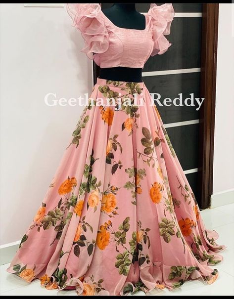 Lehanga Designs Stitched, Crop Lehanga Designs, Organza Crop Top Lehenga Indian, Floral Lehenga Blouse Designs, Georgette Crop Top Lehenga, Crop Top Lehenga Stitching Ideas, Girls Crop Tops Lehnga, Ruffle Blouse Designs For Lehenga, Floral Organza Long Frocks Indian