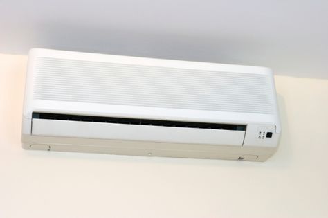 A ductless mini-split air conditioner is one solution to cooling part of a house. | Photo courtesy of ©iStockphoto/LUke1138. Ductless Ac, Door Overhang, Tiny House Appliances, Ductless Air Conditioner, Mini Split Ac, Split System Air Conditioner, Ductless Mini Split, Window Casing, Hvac Unit