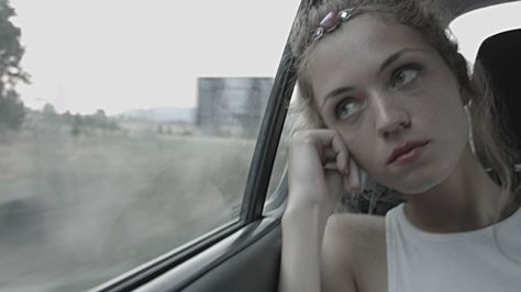 Woman Looking Out Passenger Window Inside The Car Stock Footage Video ... Car Window Drawing, Inside A Car Reference, Sticking Head Out Car Window Aesthetic, Looking Out Car Window Drawing, Head Out The Car Window Aesthetic, Looking Out Car Window, Looking Out Of Car Window, Person Looking Out Car Window, Sitting In Car