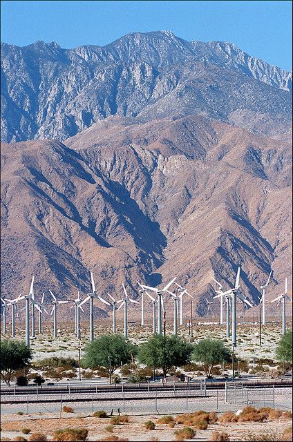 San Gorgonio Pass Wind Farm, Desert Hot Springs, California. San Jacinto Mountains in the background. Near Palm Springs 🗺 🚗 🚌 ✈️ 🎒 🚊 🏍️ 🚀 Welcome to www.VisualTshirt.com 👕 Shop Your Perfect Traveling Apparel - T-shirt, V-neck, Long Sleeve, Hoodie & More  . . #hotsprings #travel #nature #japan #spa #photography #travelphotography #holiday #mountains #love #outdoors #relax #trip #instagood #adventure #roadtrip #onsen #wanderlust #hiking #christmas #iceland #travelblogger #winter #instatrav Desert Cities, San Jacinto Mountains, Desert Southwest, Desert Hot Springs, American Landscape, Travel America, Desert Life, California Desert, Wind Turbines