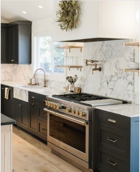 Prepare to be captivated! 🌟 Step into a world where design meets functionality in perfect harmony. 📹️ Picture this: natural stone mingling with moody cabinet hues, setting the stage for our Monogram appliances to steal the spotlight! 💫✨ Get ready to be inspired by the ultimate kitchen aesthetic that's as stunning as it is practical. Kitchen Backplash, Full House Remodel, Kitchen With Open Shelving, Transitional Home Design, Slab Backsplash, Mountain House Decor, Small Bars For Home, Den Design, Kitchen Slab