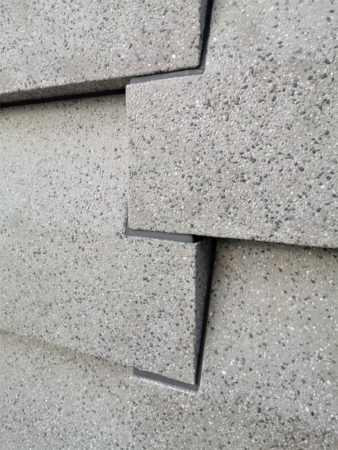 A textured and rough facade expression with exposed aggregates, creates texture and depth in the surface. With GRC you have endless options and possibilities to customise and create variation in the surface and exposed aggregate is just one of many ways. #bbfiberbeton #GRC #fiberbeton #grfcconcrete #GRFC #architecturaldesign #architecture #sustainablearchitecture #sustainability #enviromentallyfriendly #sustainablecladding #renovation #surfacedetails Grc Cladding Facade, Precast Concrete Panels, Stone Fence, Exposed Aggregate, Copenhagen Hotel, Facade Material, Concrete Panel, Concrete Facade, Stone Facade