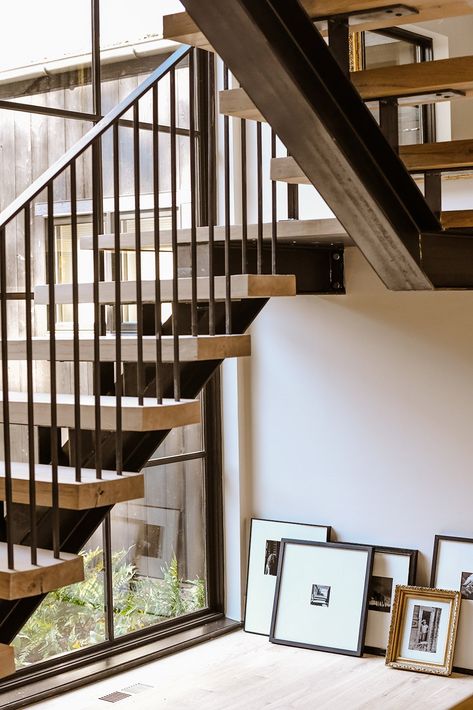 Modern Farmhouse Floating Stairs, Open Metal Staircase, Floating Stairs Railing, Vertical Railing, Open Staircase Ideas, Tennessee Farmhouse, Wood Railings For Stairs, Staircase Metal, Iron Handrails