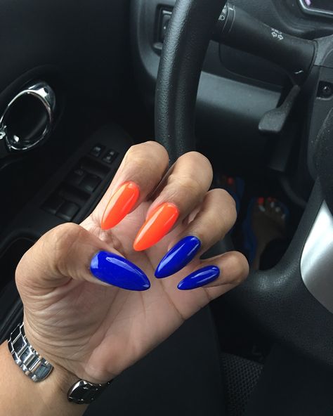 Orange Nails Blue Nails Cobalt Blue Royal Blue Gel Nails Almond Nails Blue And Orange Acrylic Nails, Neon Orange And Blue Nails, Orange And Royal Blue Nails, Nails Orange And Blue, Royal Blue And Orange Nail Designs, Dark Blue And Orange Nails, Bright Blue Almond Nails, Royal Blue And Orange Nails, Cobalt Almond Nails