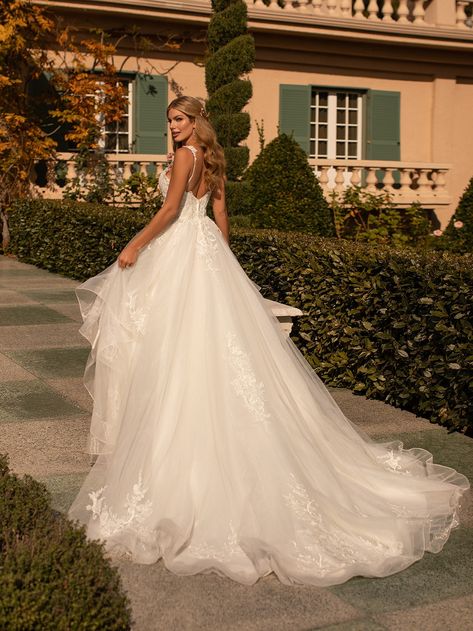 This whimsical lace flowy A-line bridal gown has cascades on the skirt and delicate spaghetti straps with beading and a low illusion lace v-shaped back. The structured bodice of this sweetheart wedding dress comes to a sexy V at the center, making the lucky bride who wears it the star of the show. An open-back wedding dress always grabs attention, and this tulle and organza gown is no exception. The full skirt sweeps down into a dramatic chapel train with a wide horsehair trim hem for a ethereal Moonlight Bridal, Organza Gown, Wedding Dresses Princess Ballgown, Sparkly Wedding Dress, Organza Gowns, A Line Bridal Gowns, Back Wedding Dress, Royal Queen, Sweetheart Wedding Dress