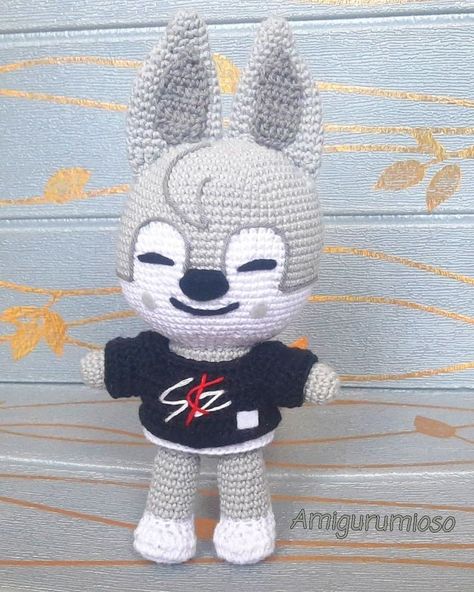 is a crocheted wolf plush toy that is perfect for cuddling or playing with. It is made with soft, high-quality yarn and has a detailed, realistic Crochet Wolf, Wolf Chan, Wolf Plush, Harry Potter Crochet, Crochet Sheep, Easy Crochet Animals, Crochet Mushroom, Crochet Keychain Pattern, Toys Crochet