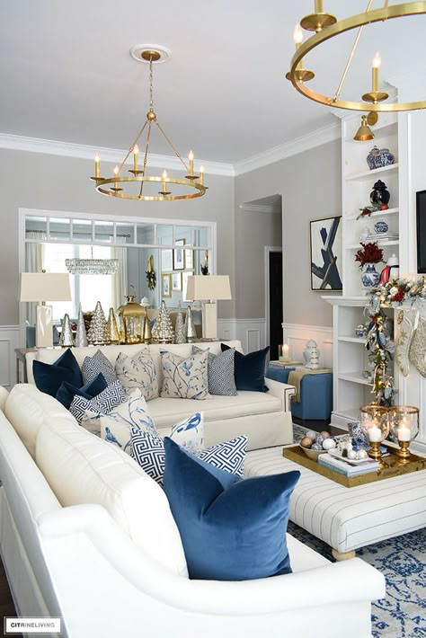 Christmas living room with white sofas and beautiful blue chinoiserie pillows. Blue And White Southern Living Room, Tea Table Decor, Chinoiserie Living Room, Waiting Room Decor, White Sofa Living Room, Chinoiserie Room, 2023 Vibes, Chinoiserie Pillows, Table Decor Kitchen