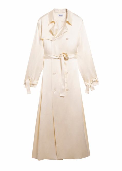 Alter Designs Long Trench Coat in Cream SatinItalian silk satin. Fluid, soft, shiny. Adjustab Winter Silk Long Coat, Cream Long Coat With Pockets, Off White Trench Coat, Ivory Trench Coat, Cream Trench Coat, Silk Trench Coat, Cream Coat, Long Trench, Long Trench Coat