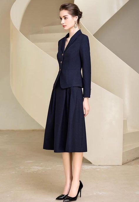 Look graceful and timeless in this two-piece chic midi skirt suit. With an elegant full skirt and tailored jacket, you'll feel timelessly elegant and sophisticated—perfect for work, special occasions, and everything in between. Make a statement in this beautiful skirt suit. Blazer and Full Midi Skirt V-Neck, Long sleeves Flap Pockets Structured shoulders. Polyester 100% Lining: Polyester 100% Imported Brand -Aision Model Number - 233017C1, 233017S2 Blazer And Long Skirt Outfits, Suit Skirt Outfit Classy, Graduate Clothes, Elegant Outfit Classy Chic, Business Professional Outfits Women, Woman Suit Fashion Classy, Coat And Skirt, Casual Classy Outfits, Long Skirt Suits