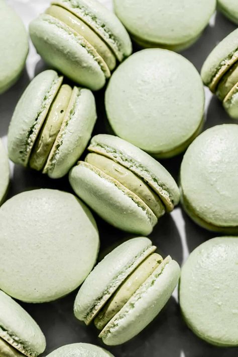 Bite into one of these pistachio macarons to experience the magic of a chewy shell contrasted with a creamy pistachio French buttercream. Follow my step by step photos and instructions to make your own bakery-worthy macarons! Blue Macaroons, Blue Macarons, Pastel Macarons, Macaron Recipes, French Buttercream, Le Macaron, Macaron Template, Pistachio Gelato, Macaron Filling