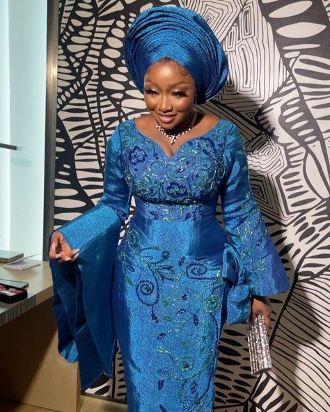 Yoruba woman in a traditional style Christian Engagement Dress, Yoruba Wedding Dress, Yoruba Traditional Wedding Attire, Hausa Bride, Engagement Dress For Bride, Yoruba Bride, Ankara Dress Designs, African Traditional Wedding Dress, Ankara Long Gown Styles