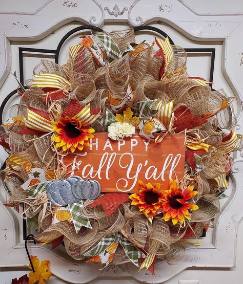 Hey friends wow your friends and neighbors with this beautiful fall wreath on your front door or in your entry way.  The beautiful fall colored premium ribbon added with adorable galvanized metal pumpkin decor and the popular "happy fall ya'll" sign just makes this wreath scream cuteness!  This adorable wreath is a perfect way to welcome fall in to your home or business.  It would even look festive added to your fall decor around your house hanging on a wall or over a mantel!  What a fun and fes Hey Yall Wreath, Fall Door Hangers A-door-able Hangers Llc, Its Fall Yall Door Sign, Happy Fall Yall Sign, Fall Porch Signs Wreaths & Garlands, Fall Mesh Wreaths, Happy Fall Yall Wreath, Metal Pumpkins, Holiday Wreaths Diy