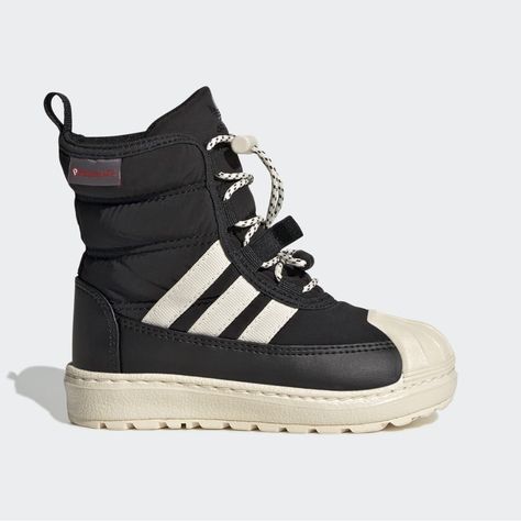 Inspired by the adidas Superstar sneaker, these lightweight boots for toddlers take cues from that shoe's best design details, right down to the iconic shell toe. A cozy insulated PrimaLoft® upper keeps tiny feet nice and warm, and the EVA midsole and OrthoLite® sockliner deliver extra comfort. The toggle-based laces are easy to secure, even when your little one is feeling wiggly. Made with a series of recycled materials, this upper features at least 50% recycled content. This product represen Black Superstar, Adidas Boots, Toddler Adidas, Lightweight Boots, All Nike Shoes, Superstars Shoes, Sock Sneakers, Toddler Sneakers, Adidas Originals Superstar