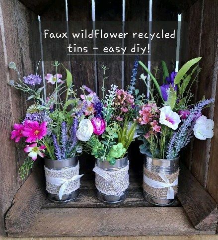 Tin Can Centerpieces, Faux Flower Centerpiece, Wild Flower Arrangements, Recycled Cans, Wildflower Centerpieces, Wildflower Wedding Theme, Rustic Arrangements, A Bunch Of Flowers, Tin Flowers