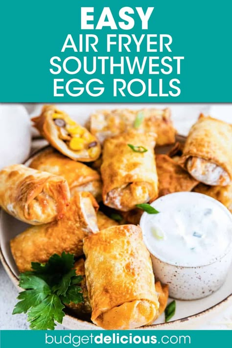 A PILE OF SOUTHWESTERN EGROLLS ON A PLATE WITH A SIDE OF DIP Southwest Eggrolls Air Fryer, Southwest Eggrolls Recipe Easy, Southwest Eggrolls Recipe, Chicken Recipe Air Fryer, Chicken Egg Rolls Recipe, Airfryer Snacks, Wrapper Recipes, Air Fryer Egg Rolls, Southwest Egg Rolls