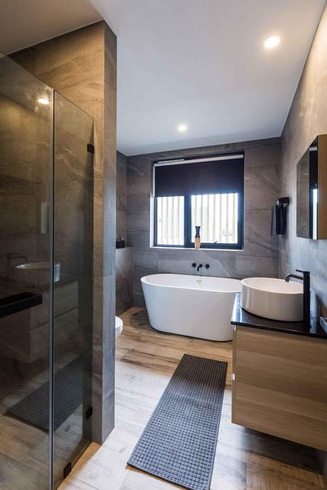 Large bathroom with shower cabin and free-standing bathtub Shower Cabins, Standing Bathtub, Large Bathroom, Shower Cabin, Large Bathrooms, Free Standing Bath Tub, Beautiful Bathrooms, Boutique Hotel, Bathroom Ideas