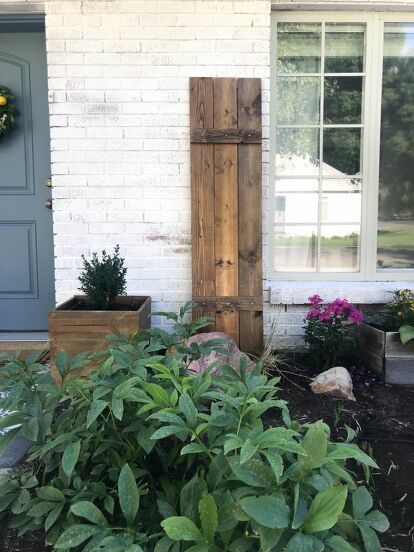 After I shared my DIY window mullions I had quite a few people recommend adding shutters to our window. I’ve wanted shutters for a long time and finally decided it was time to make my own to help complete my ‘weathered cottage’ look. we used 6- 1x6 boards and then planned to use a 1x4 to go across the top and bottom of each shutter. I decided to stain the wood prior to assembly because I figured it would be easier than trying to get the stain in each nook and cranny once they w… Homemade Shutters Outdoor, Stained Shutters, Window Mullions, Indoor Shutters, Farmhouse Shutters, Topiary Diy, Antique Dining Chairs, Plank Ceiling, Diy Shutters