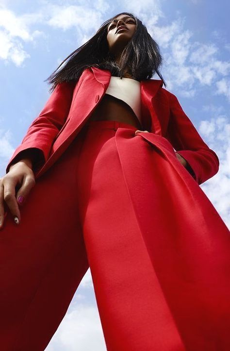 Use low camera angles for cool effects in your model posing. #fashionshoot Red Coat, Hands On, A Woman, Pants, Photography, Red, Trousers