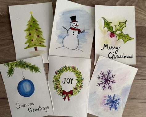 Join us as we create 6 watercolor Christmas greeting cards! Your loved ones will feel special when you give them a card hand-painted by you! No experience necessary, you will be helped every step of the way. *Please arrive 10-15 mins early to choose your seat and order any food or drinks if interested* Hand Painted Watercolor Christmas Cards, Holiday Watercolor Cards, Easy Watercolor Christmas Cards, Watercolor And Pen Art, Market Entrance, Hand Painted Greeting Cards, Christmas Fundraiser, Christmas Watercolors, Hand Painted Christmas Cards