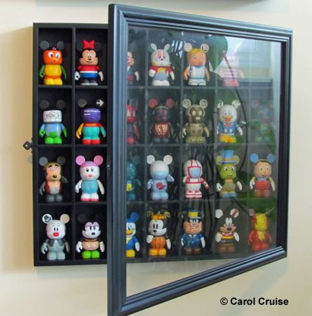 Great way to display Vinylmation: Shot glass display case from Michael's Arts & Crafts Figpin Display Ideas, Vinylmation Display, Figurine Display Ideas, Diy Display Case, Shot Glass Display, Funko Pop Shelves, Funko Pop Display, Vinyl Display, Figurine Display