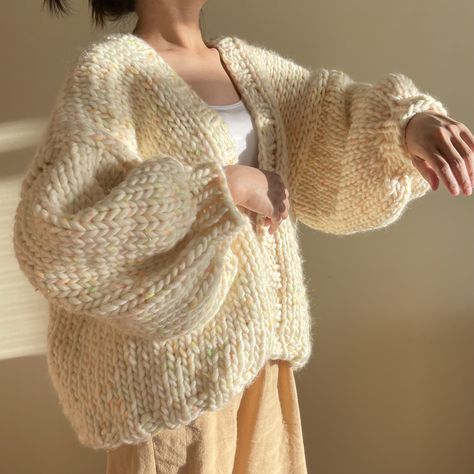 Super soft and comfortable to wear. Made of chunky pure wool. Size: Width 29 Inches           Length 21 Inches P.s. Model wearing cardigan is 5'3 / 104 lbs. I am happy to knit custom sweater if you would love to have other colors or design, just feel free to message me! Care: hand wash in cold water not over 30 degree, lay flat to dry. Oversize Cardigan, Hand Knit Cardigan, Chunky Knit Cardigan Oversized, Oversized Wool Knitted Cardigan, Chunky Cardigan Aesthetic, Cozy Beige Chunky Knit Cardigan, Cozy Oversized Handmade Cardigan, Oversized Chunky Knit Cotton Cardigan, Chunky Cardigan Outfit