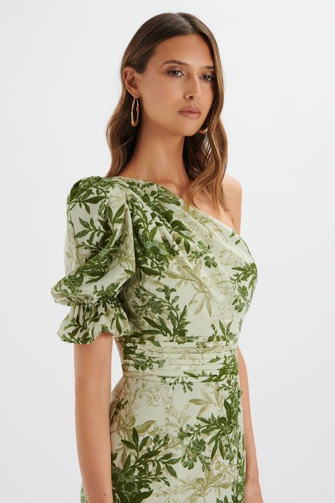 Incorporate floral elegance into your summer wardrobe with the NAKIA Asymmetric Puff Sleeve Midi Dress. Featuring an eye-catching botanical print and an asymmetric puff sleeve, this midi dress effortlessly combines style and comfort. The front split adds a touch of elegance, making it the perfect summer edition to your Puff Sleeve Midi Dress, Lavish Alice, Sleeve Midi Dress, Botanical Print, Printed Midi Dress, Botanical Prints, Perfect Summer, Summer Wardrobe, Day Dresses