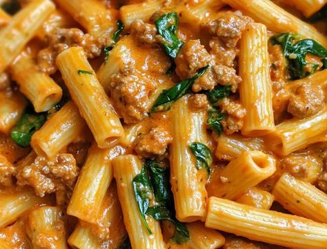 Creamy Sausage Rigatoni with Spinach and Tomato Sauce: A One-Pot, 30-Minute Meal Pasta With Ground Sausage And Spinach, Rigatoni Spinach Recipes, Creamy Sausage Rigatoni With Spinach, One Pot Italian Sausage Rigatoni, Spinach Rigatoni, Sausage And Rigatoni Recipes, One Pot Rigatoni Pasta, Pasta With Sausage And Spinach, Tuscan Rigatoni