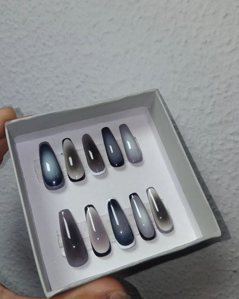 Monochrom aura press-on nails in sleek black, white, and gray. They're customizable and come in 13 different shapes. Each set includes everything you need: 🤍Application & removal Guide 🖤Alcohol pad 🩶Buffing block 🤍Cuticle stick 🖤Glue Tabs 🩶Mini File. Why go for press-ons? ✅Super easy to apply in minutes ✅No expensive salon trips needed ✅Reusable for multiple wears ✅ Gentle on your natural nails, causing less damage What makes ours special? 💅🏻Trendy designs 💅🏻High-quality materials f... Black White Aura Nails, White Aura Nails, White Aura, Press Ons, Trendy Designs, Nail Games, Black Nails, Different Shapes, White Nails