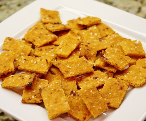 These crackers were a happy accident!  I set out to make sweet potato and coconut flour into something crispy and edible, and ended up with a delicious 5-ingredient cheese cracker that tastes remarkably similar to Cheez-its!  I will warn you in advance that these are somewhat addictive :) Ingredients: 1/4 cup coconut flour 1 egg 1 cup grated parmesan cheese 1 cup mashed sweet potato (cooked) course sea salt Instructions: 1.  Preheat your oven to 350 degrees F. ... Potato Crackers, Sweet Potato Crackers, Homemade Cheez Its, Flax Seed Recipes, Cracker Recipes, Paleo Snacks, Grain Free Recipes, Mashed Sweet Potatoes, Sweet Potato Recipes