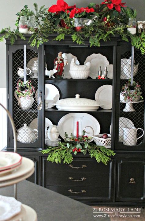 Hutch painted black, center doors removed, displays white ironstone and Christmas decor. Christmas Hutch, Black Hutch, Painted Hutch, Black China, Milk Glass Collection, Hutch Decor, Christmas Dining Room, Christmas Tours, Dried Oranges