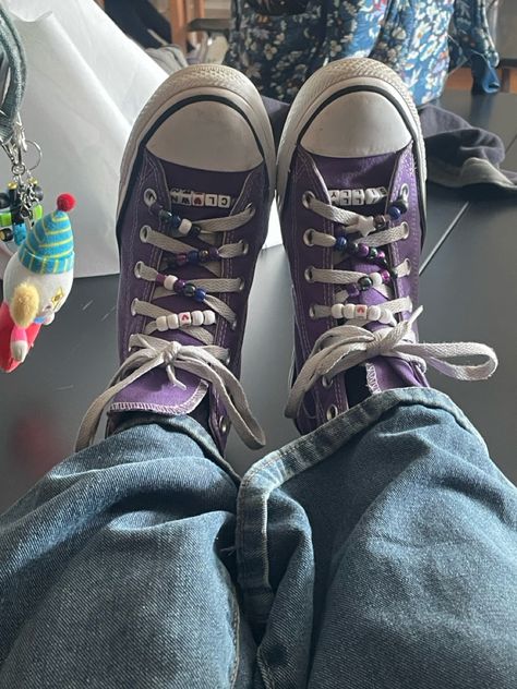 “Silly Clown” clown beads on purple converse!!! :) Converse Diy Beads, Beads On Converse, Purple Converse Aesthetic, Converse Beads, Dark Purple Converse, Stephanie Brown Aesthetic, Purple Converse Outfit, Beaded Converse, Dark Red Converse