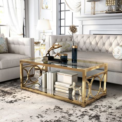 Pehrson Contemporary 47-inch Glass Top 1-Shelf Coffee Table by Silver Orchid - Bed Bath & Beyond - 11118665 Table Sets For Living Room, Black And Gold Living Room Coffee Tables, Gold Mirrored Coffee Table, Decor For Coffee Table Living Rooms, Glass Table Decor Living Rooms, Mirror Coffee Table Living Room, Glass Coffee Table Decor Living Room, Glass Coffee Table Decor Ideas, Gold Coffee Table Living Room