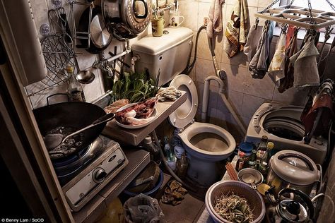 Statistics show around 200,000 people live in such conditions. Pictured above, a cooking a... Shock Pictures, Kowloon Walled City, Kitchen Confidential, Bar In Casa, Saul Leiter, Underground Bunker, Tiny Spaces, Affordable Housing, Cubicle