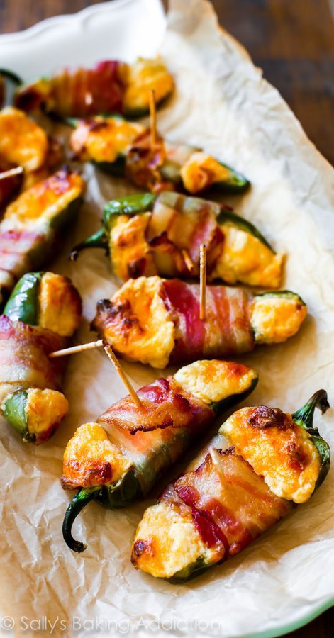 Super cheesy bacon wrapped jalapeños! These are super easy to make. Recipe found on sallysbakingaddiction.com Fall Party Appetizers, Super Bowl Snack Recipes, Skewer Appetizers, Bacon Wrapped Jalapenos, Bowl Party Food, Elegant Appetizers, Football Party Food, Best Appetizer Recipes, Superbowl Snacks