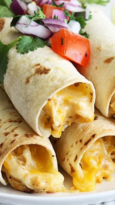 Slow Cooker Cream Cheese Chicken Taquitos Recipe ~~ Flavorful creamy chicken made in the slow cooker, then rolled up in soft tortillas and baked or a few minutes until crispy! Cream Cheese Chicken Taquitos, Slow Cooker Cream Cheese Chicken, Soft Tortillas, Taquitos Recipe, Chicken Taquitos, Cream Cheese Chicken, Cheese Chicken, Crockpot Cooking, Crock Pot Slow Cooker