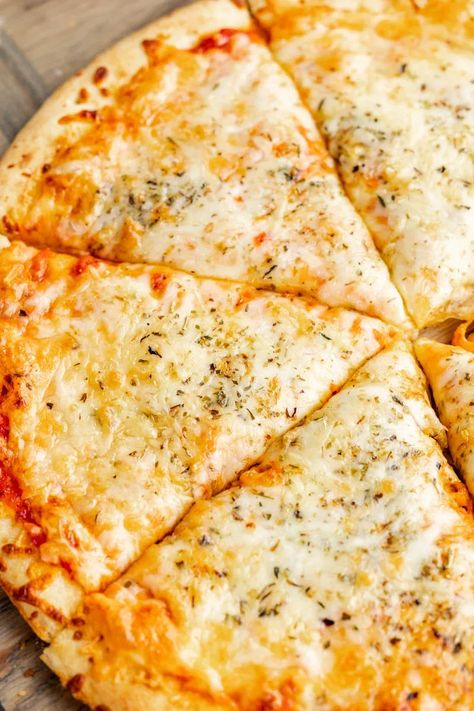 Bring the delight of pizzeria-style pizza right into your kitchen with this easy cheese pizza recipe – perfect for family dinner nights or weekend feasts. Easy Cheese Pizza Recipe, No Cheese Pizza, 4 Cheese Pizza, Cheese Pizza Recipe, The Stay At Home Chef, Best Easy Dinner Recipes, Family Dinner Night, Stay At Home Chef, Pizza Sauce Recipe