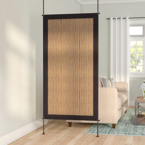 Ideal for smaller spaces like lofts and studio apartments, this distinctive room divider separates while also adding seaside-inspired style. Featuring a folding design that can fit to most ceiling heights, its frame is crafted of wood while the centre's finish contrasts. Try it between your bed and the living area for a little extra privacy, plus a playful taste of the tropics. Or, if there's a corner of the master suite going unused, just put this piece to work! Once you have that sp... Room Divider Ideas Diy, Room Divider Diy, Metal Room Divider, Fabric Room Dividers, Portable Room Dividers, Bamboo Room Divider, Sliding Room Dividers, Living Room Divider, Wooden Room Dividers