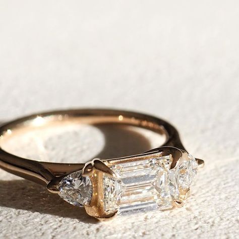 Kate & Kole on Instagram: "Isla 1.27ct — Ready to Wear This beautifully refined trilogy ring features an east west set emerald cut lab-grown diamond, shouldered by a duo of meticulously set trillion cut diamonds. Available online now for a limited time — for delivery within 7 - 10 days to suit a proposal date in the near future. #kateandkole #trilogyring #emeraldcutdiamond" Julie Cohn Design, East West, Georg Jensen, Emerald Cut Diamonds, Emerald Cut, Lab Grown Diamonds, Emerald, Diamond Cuts, Ready To Wear