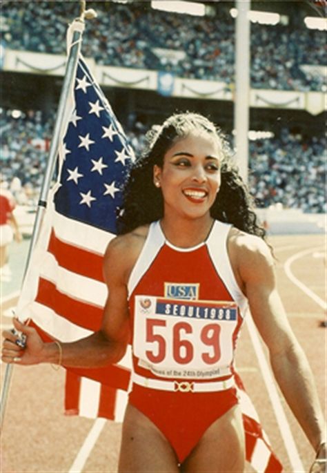 Florence Griffith Joyner died in her sleep on September 21, 1998 at the age of 38.]   Florence Griffith Joyner made sports history in 1988 when she became the first American woman to win four medals in a single Olympic Games, with three golds and a silver. In doing so, she set world records in the 100-meter and 200-meter track events, earning her the title “World’s Fastest Woman.” As the world watched, Flo-Jo changed the image of female track athletes with her custom-designed running outfits and Florence Griffith Joyner, Flo Jo, Wilma Rudolph, Track And Field Athlete, Club Red, Indiana Pacers, African American Women, Female Athletes, Women In History