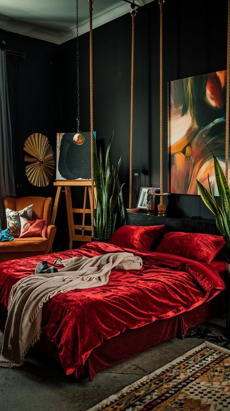 Step into a world of romance! This bedroom features dark walls paired with a vivid red velvet bedsheet, creating an intimate atmosphere perfect for passionate evenings. #homedesign #homedecor #halloweenvibe #homeinterior #interiordesign #homeinspo Dark Boho Aesthetic Bedroom, Red Bed Frame Room Ideas, All Red Bedroom, Dark Bedroom Ideas Modern, Black And Maroon Bedroom, Bold Bedroom Color Scheme, Red Themed Bedroom Aesthetic, Red Room Inspiration, Bedroom Inspiration Cozy Dark