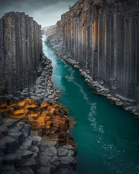 "Columnar Jointing" The cathedral-like cliff formation surrounding the turquoise blue river is majestic. 🌊 #iceland .  @beyondthelands |… Iceland Wallpaper, Iceland Nature, Future Architecture, Iceland Photos, Iceland Landscape, Blue River, Sunset Wallpaper, Beautiful Landscape Wallpaper, Fantasy Art Landscapes