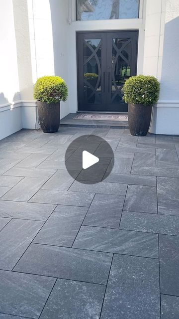 Paver Man on Instagram: "The elegance of the 3cm thick Dark Silver Gray porcelain tile transforms your driveway into something extraordinary. This driveway, covered with this sophisticated material, combines durability and beauty, creating a modern look that impresses everyone who crosses it." Driveway Tiles Modern, Dark Grey Driveway, Driveway Asphalt And Pavers, Gray Paver Walkway, Gray Pavers Driveway, Modern Driveway Ideas, Gray Pavers, Driveway Tiles, Driveway Pavers Design