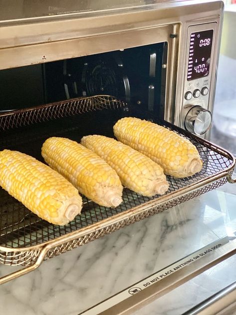 Air Fryer Corn on the Cob (Quick and Easy) | Kitchn How To Roast Corn, Air Fryer Cleaning Hacks, Oven Air Fryer Recipes, Air Fryer Cleaning, Roast Corn, Toaster Oven Air Fryer, Air Fryer Corn, Seasoned Corn, How To Make Corn