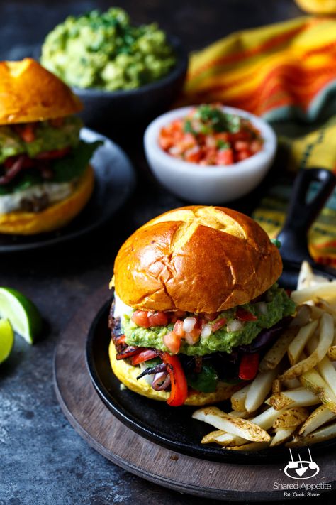 Fajita Burgers with grilled peppers and onions, guacamole, and pico de gallo | sharedappetite.com Fajita Burgers, Corn Burger, Guacamole Burger, Mexican Burger, Grilled Peppers And Onions, Burger Patty, Sriracha Chicken, Bbq Dishes, Avocado Ranch