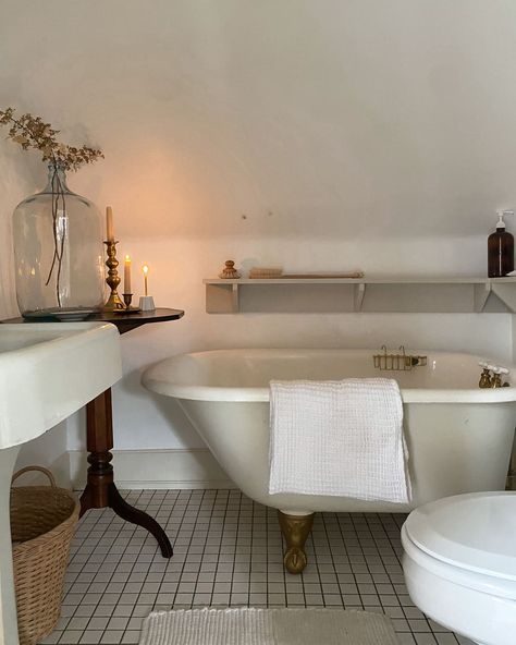 Vintage claw foot tub in newly renovated bathroom. Claw Tub Bathroom, Small Clawfoot Tub, Small Bathroom With Clawfoot Tub, Thrifted Living Room, Glass Tub Enclosure, Bathroom Clawfoot Tub, Bathroom With Clawfoot Tub, Tub Bathroom Ideas, Clawfoot Tub Bathroom