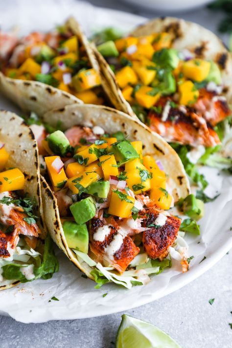 Salmon Taco Recipe, Spicy Salmon Tacos, Salmon Mango Tacos, Healthy Salmon Tacos, Salmon Tacos With Mango Salsa, Salmon Tacos Recipe Easy, Prenatal Recipes, Mango Salsa Tacos, Chipotle Salmon Tacos