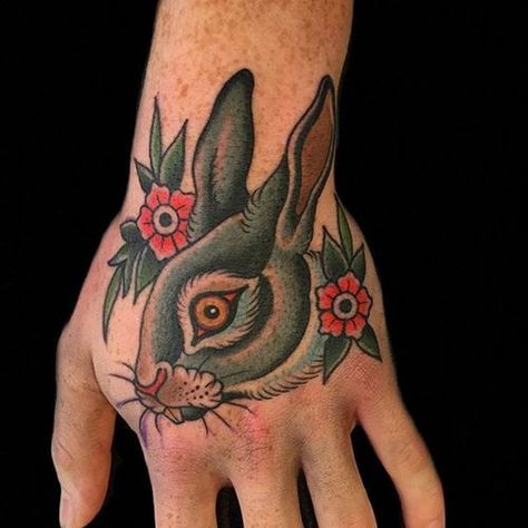 Tattoo uploaded by Robert Davies • Rabbit Tattoo by Gordon Combs #rabbit #traditionalrabbit #traditional #traditionalanimal #animal #traditionalartist #GordonCombs • Tattoodo Traditional Tattoo Rabbit, Tattooed Hands, Rabbit Tattoo, Bunny Tattoos, Frog Tattoos, Rabbit Tattoos, Spooky Tattoos, Tattoo Graphic, Traditional Ink