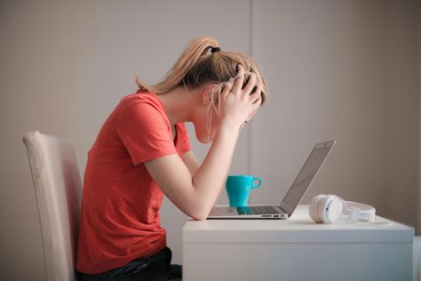 Woman in Red T-shirt Looking at Her Laptop Gavin Memes, دورة شهرية, Endocannabinoid System, Her Campus, Wayne Dyer, Burn Out, Oprah Winfrey, Student Loans, Omega 3