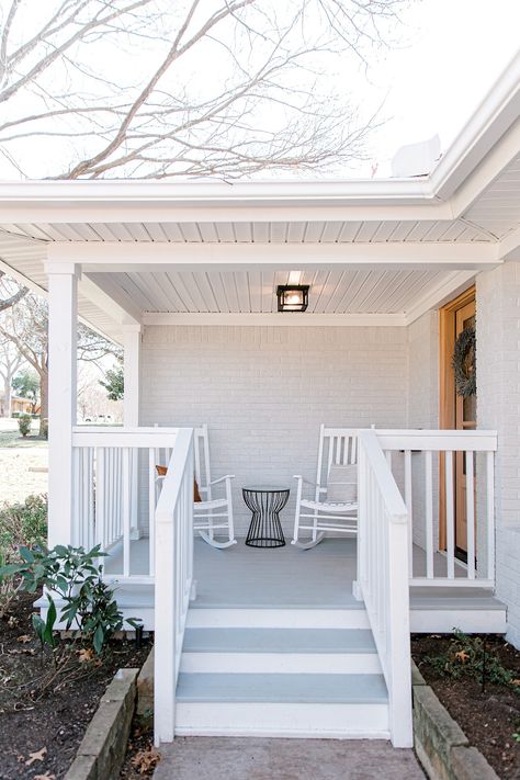 Front patio with wood decking, wood railing and painted brick. Neutral colors of gray and white on house exterior. Painted Floor Porch, Painted Front Porch Railing, Painted Front Porch Steps, Front Porch Color Ideas Paint, Wood Porch Paint Ideas, Painted Front Porch Wood, Update Concrete Porch, Concrete Porch Paint Ideas, Painted Front Porch Concrete