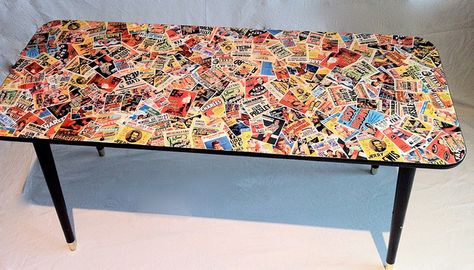 decoupage table top - Possibility for desk/craft table using old movie posters??? Sticker Table Top, Stickers On Furniture, Decoupage Table Top Ideas, Decoupage Table Top, Nail Knowledge, Modge Podge Fabric, Table Stickers, Collage Table, Sticker Table